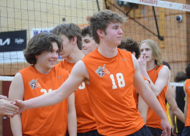 Brother Rice's Tater Klinger celebrates with his teammates after beating Providence during a Catholic League crossover match in Chicago on Tuesday, April 9, 2024. (Jeff Vorva / Daily Southtown)