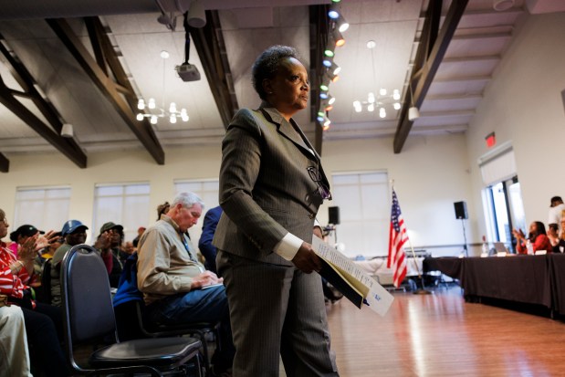 Former Chicago Mayor Lori Lightfoot attends a Village Board meting on Monday, April  8, 2024, in Dolton. Some Dolton trustees hires Lightfoot as an outside attorney as they push for investigations into the spending of Mayor Tiffany Henyard, who they allege has mismanaged village finances. (Armando L. Sanchez/Chicago Tribune)