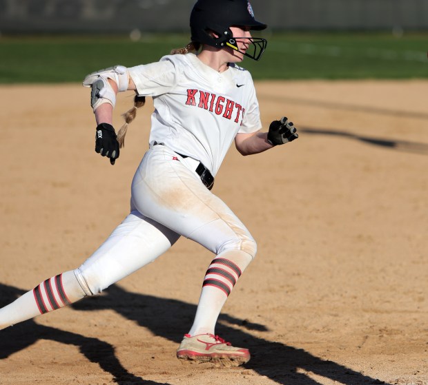 Lincoln-Way Central's Kendall Pearson makes her way home during the softball game against Lincoln-Way East in Frankfort Monday, April 8, 2024. (James C. Svehla/for the Daily Southtown)