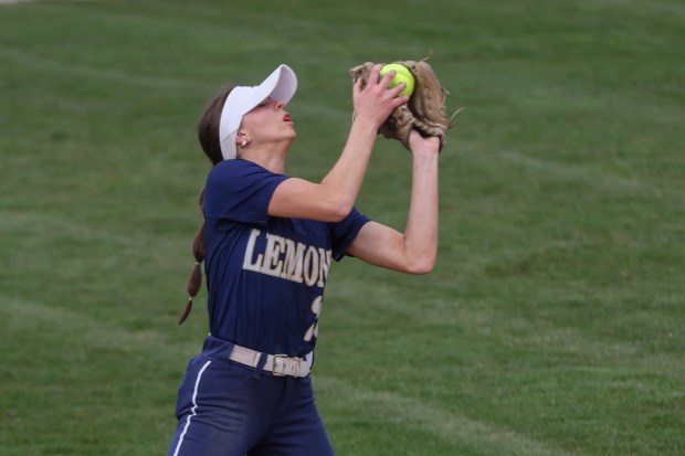 Lemont's Allison Pawlowicz (25) catches a fly ball during a game against Minooka in Lemont on Wednesday, April 10, 2024. (Troy Stolt/for the Daily Southtown)