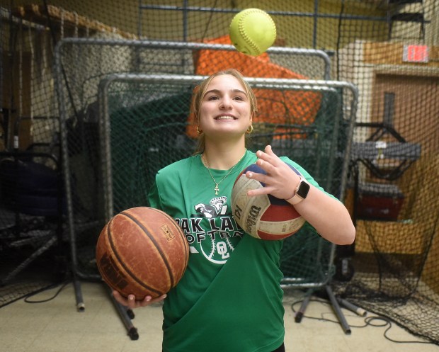 Oak Lawn's Kaitlyn Berkery has juggled three sport while at Oak Lawn High School Thursday, April 4, 2024 in Oak Lawn, IL. (Steve Johnston/Daily Southtown)