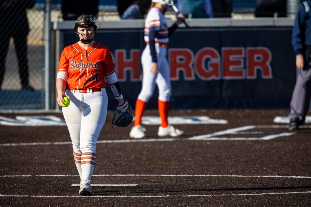 Shepard's Sarah Kreamalmeyer (14) walks to the back of the pitching circle during a nonconference game against Stagg in Palos Hills on Friday, March 19, 2024, in city. (Vincent D. Johnson/for the Daily Southtown)