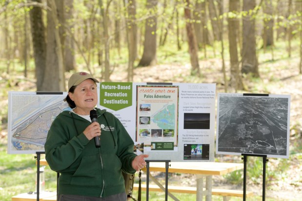 Eileen Figel, interim general superintendent for the Forest Preserves of Cook County speaks April 25, 2024, during a tour of Red Gate Woods in Willow Springs that showcased a restoration project underway in the Palos Preserves. (Mark Black / Daily Southtown)