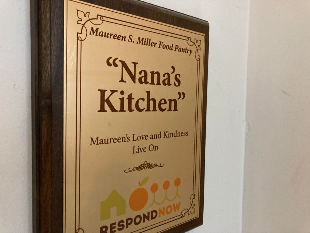 A plaque inside the food pantry at Respond Now in Chicago Heights show the pantry is dedicated to Maureen Miller, a longtime volunteer. (Mike Nolan / Daily Southtown)