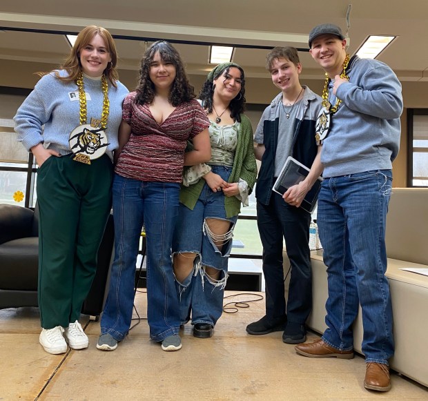 Authors Bridget Morrissey, far left, and Ian Ryan, far right, stand with student interviewers Julia Fierro, left, Hannah Karadsheh and Ethan Coe during Senior LitFest last month at Oak Forest High School. (Jennifer Schanz)