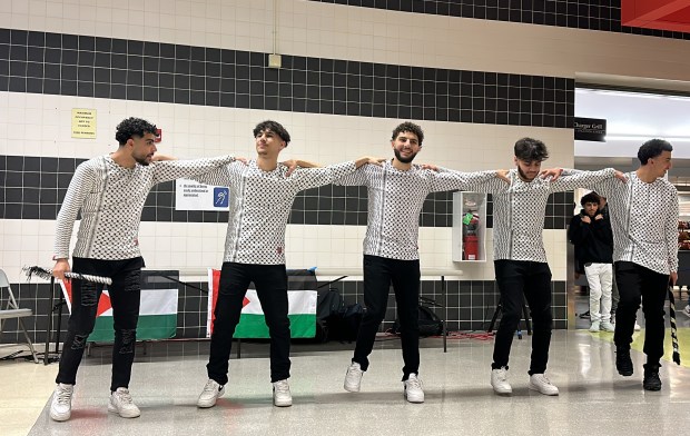 Members of the Stagg High School dabka team, a branch of the school's Arab-American Heritage Club, give a performance recently at the school in Palos Hills. (Suzan Atallah)