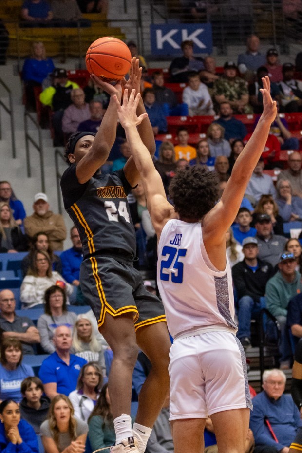 AJ Dixon (24), a freshman guard on the Triton College Trojans men's basketball team, was named to the All-Tournament Team in the NJCAA Division I Championship Tournament played March 30, 2024 in Hutchinson, Kansas v. Barton County Community College, located in Kansas. (Courtesy NJCAA)