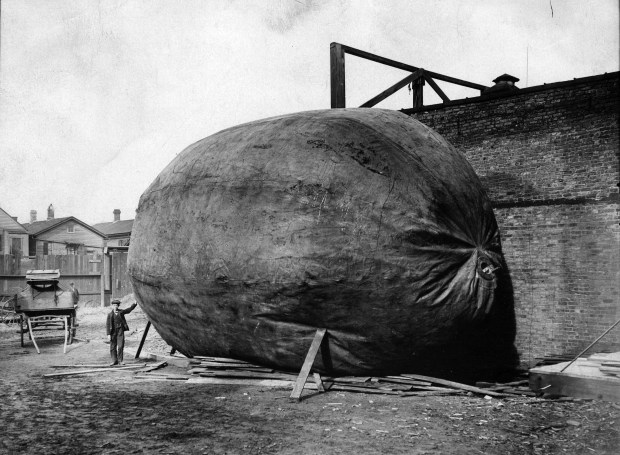 Peter Nissen and his Foolkiller floating balloon at 405 West Kinzie Street in Chicago. Nissen, a Great Lakes daredevil, tried to cross Lake Michigan in the "rolling bag" called the Foolkiller No. 3 in 1904 and lost his life in the attempt. (Chicago Tribune archive)