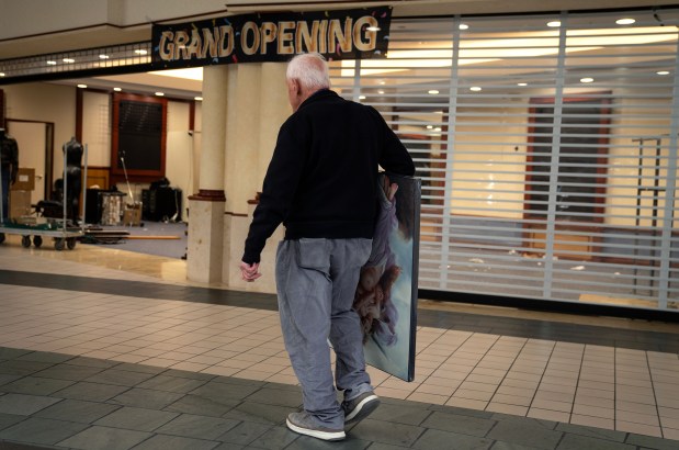 A shopper finds a last minute bargain at the Spring Hill Mall in West Dundee, which is closing after 43 years, Wednesday, March 20, 2024. (E. Jason Wambsgans/Chicago Tribune)