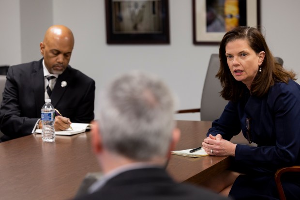 Democratic candidates for Cook County State's Attorney Eileen O'Neill Burke, right, and Clayton Harris III, left, speak at an interview with members of the Chicago Tribune Editorial Board on Feb. 14, 2024, at the Chicago Tribune Freedom Center. (Vincent Alban/Chicago Tribune)