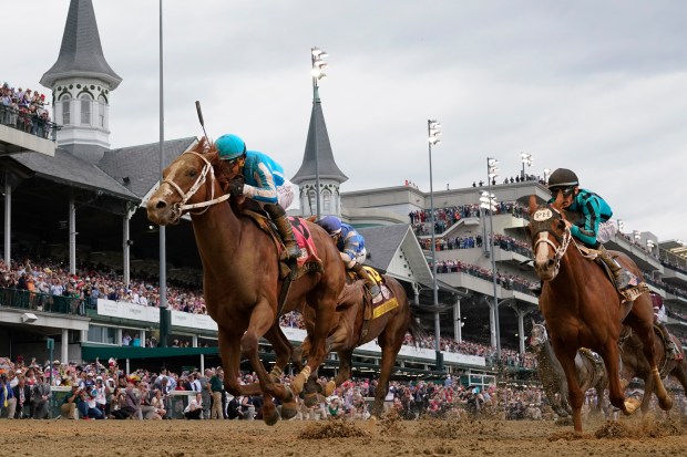 Mage (8), with Javier Castellano aboard, wins the 149th running of the Kentucky Derby horse race at Churchill Downs on May 6, 2023, in Louisville, Kentucky. (Jeff Roberson/AP)
