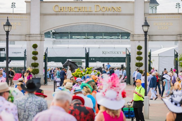 Racing fans arrive for the Kentucky Derby at Churchill Downs in Louisville, Kentucky on May 6, 2023. (Xavier Burrell/The New York Times)