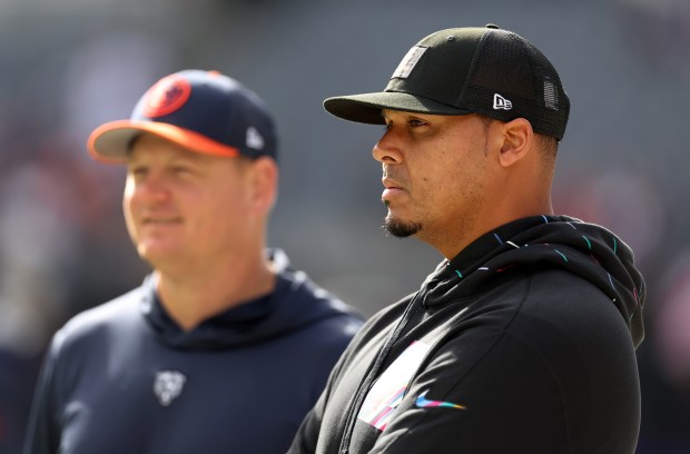 Chicago Bears general manager Ryan Poles, right, stands beside offensive coordinator Luke Getsy before a game against the Minnesota Vikings at Soldier Field in Chicago on Oct. 15, 2023. (Chris Sweda/Chicago Tribune)