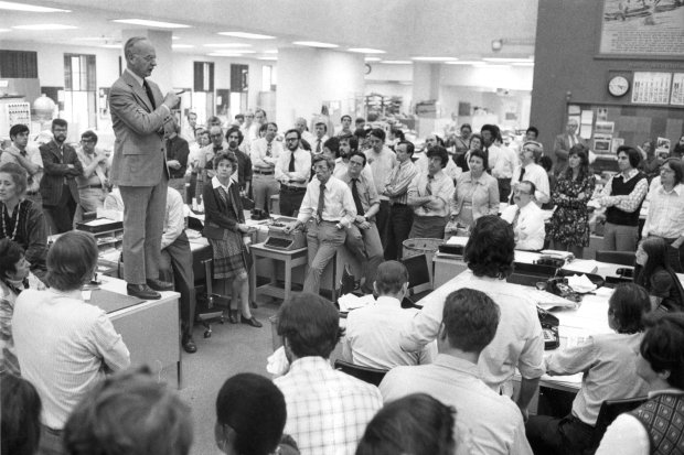 Clayton Kirkpatrick, editor of the Chicago Tribune, tells the staff about President Richard Nixon's tapes and the decision to print the transcripts at the City Room of Tribune Tower on April 30, 1974. (Art Walker/Chicago Tribune)
