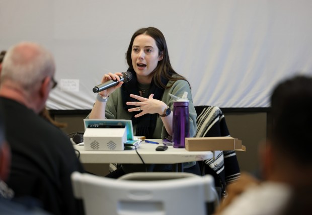 Erin Vogel, 9th Police District Council member, addresses attendees during the council's monthly meeting at the McKinley Park Field House, March 27, 2024, in Chicago. (John J. Kim/Chicago Tribune)