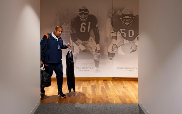 Bears President Kevin Warren walks through the empty halls as he arrives at work before 6 a.m. on Thursday, June 29, 2023, at Halas Hall. (Brian Cassella/Chicago Tribune)