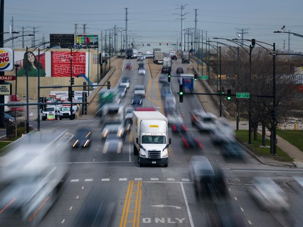 A truck waits in a turn lane in heavy traffic near 41st Street and Pulaski Road in the Archer Heights neighborhood, March 28, 2024. (E. Jason Wambsgans/Chicago Tribune)