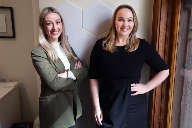 Jaclyn Ross, left, and Tory Eisenlohr-Moul in Ross' office in Chicago on March 15, 2024. The two worked on a study for the University of Illinois at Chicago that found menstrual cycles affect day-to-day suicide risk. (Terrence Antonio James/Chicago Tribune)