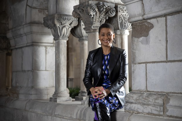 Chicagoan of the Year Jacqueline Stewart poses for a portrait outside her home Tuesday, Dec. 8, 2020, in Chicago. Stewart is a longtime University of Chicago film professor, archivist and curator, director of the South Side Home Movie Project. More recently, she is the first Black host of Turner Classic Movies. In January she takes an extended leave the university to become the director of the Academy of Motion Pictures museum.