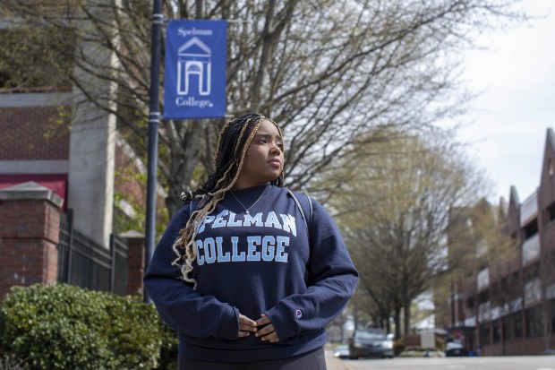 Amara Harris, standing near the Spelman College campus in Atlanta where she is a junior, is still fighting a ticket she got three years ago as a student at Naperville North High School.