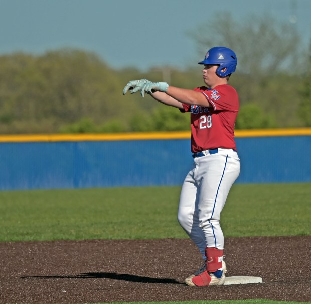 Marmion's Ethan Flores gestures to his dugout after hitting an RBI double. Marmion defeated Aurora Central Catholic, 5-2 in baseball, Tuesday, April 30, 2024, in Aurora, Illinois. (Jon Langham/for the Beacon-News)