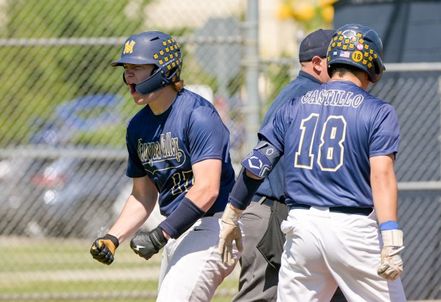 Neuqua Valley's Mike Langan (17) celebrates scoring against West Aurora during the Class 4A Neuqua Valley Regional final in Naperville on Saturday, May 25, 2024. (Mark Black / for the Beacon-News)