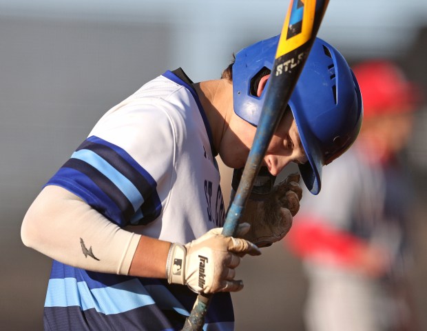 St. Charles North's Ty Heimbuch (4) reacts to being brush backed by a pitch in the fourth inning during a Class 4A St. Charles North Sectional semifinal game against South Elgin on Wednesday, May 29, 2024 in St. Charles. St. Charles North won, 3-2.H. Rick Bamman / For the Beacon News