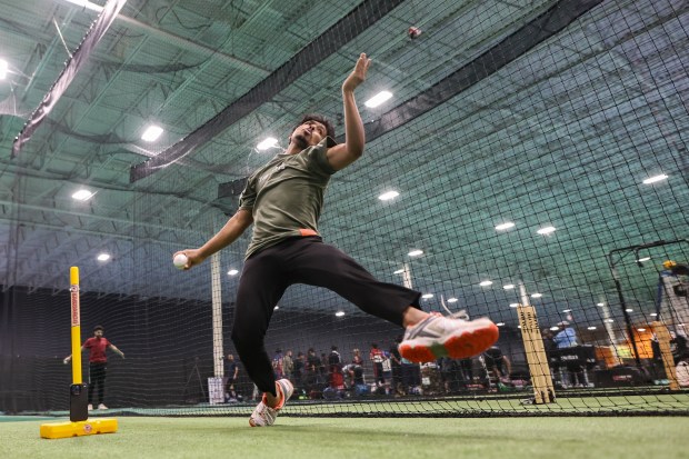 Sri Sri Dantam practices bowling during tryouts for the Breybourne Cricket Club in Naperville on Wednesday, March 27, 2024. (Troy Stolt/for the Aurora Beacon News)