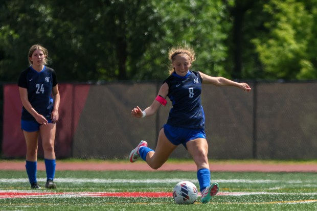 Burlington Central's Eva Samuelian (8) takes a free kick during the Class 2A state semifinal game against Crystal Lake Central in Naperville on Friday, May 31, 2024. (Troy Stolt/for the Aurora Beacon News)