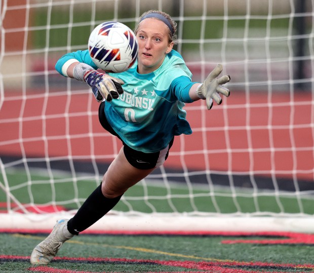 Waubonsie Valley's Lauren Bornhoff (0) makes a save against Plainfield East in the second half during the Class 3A East Aurora Regional semifinal game on Tuesday, May 14, 2024 in Aurora. Waubonsie Valley won, 4-0.H. Rick Bamman / For the Beacon-News