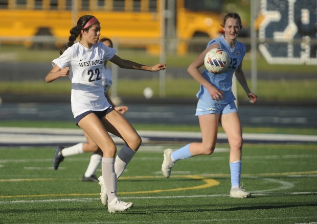 West Aurora's Sonia Alanis (22) clears the ball up field against Plainfield South during a Southwest Prairie Conference game Tuesday, April 30, 2024 in Plainfield, IL. (Steve Johnston/The Beacon-News)