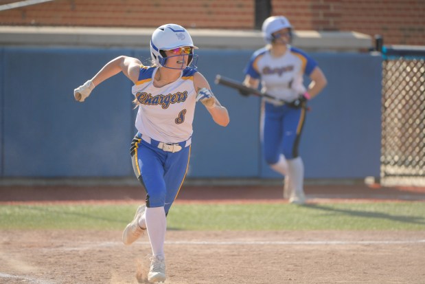 ACC's Abby Gambro (8) hits a triple against Regina during the ACC 2A Regional Semifinal in Aurora on Wednesday, May 15, 2024. (Mark Black / for the Beacon-News)