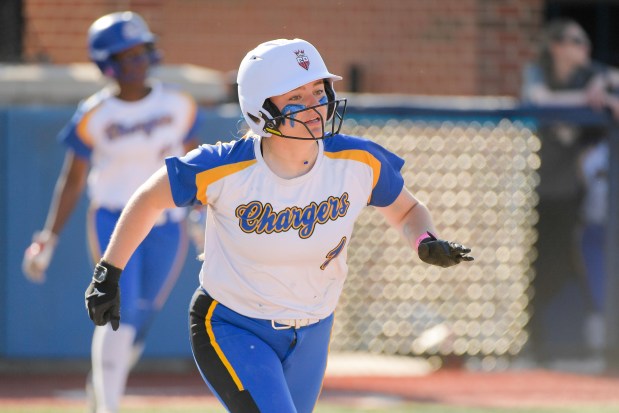 ACC's Kate Gambro (1) sprints to first against Regina during the ACC 2A Regional Semifinal in Aurora on Wednesday, May 15, 2024. (Mark Black / for the Beacon-News)