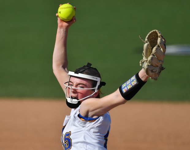 Aurora Central Catholic pitcher Corina Miller delivers to a Richmond-Burton batter during the Class 2A Aurora Central Catholic Regional championship game on Friday, May 17, 2024, in Aurora.(Jon Cunningham/for The Beacon-News)