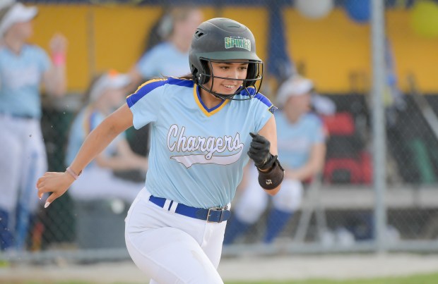 ACC's Natalie Sanchez (21) runs to first against Geneva at home in Aurora on Tuesday, May 7, 2024. (Mark Black / for the Beacon-News)