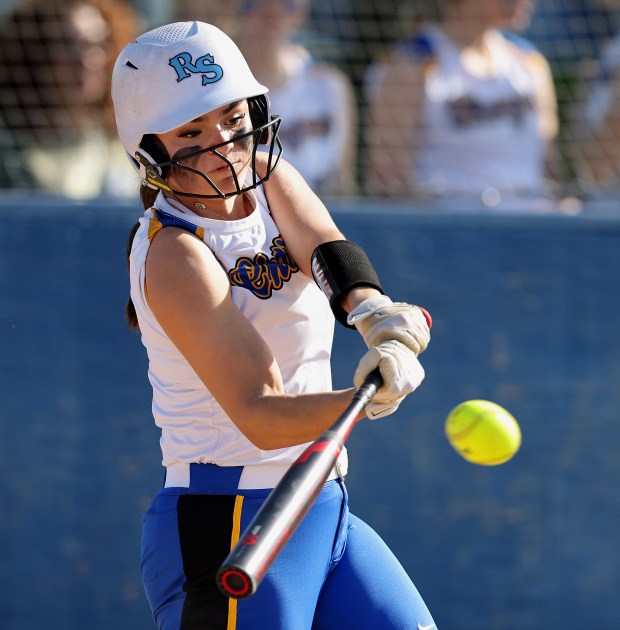 Aurora Central Catholic's Sophia Delgado (2) sends a hit into right field for a base hit during a Girls Catholic Athletic Conference game on Tuesday, April30, 2024 in Aurora. Aurora Central fell 18-8.H. Rick Bamman / For the Beacon-News