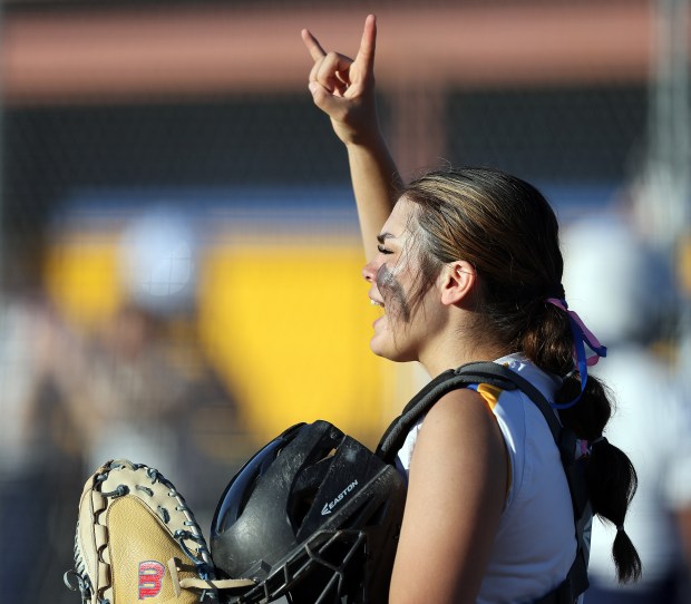 Aurora Central Catholic's Sophia Delgado (2) signals to teammates during a Girls Catholic Athletic Conference game on Tuesday, April 30, 2024 in Aurora. Aurora Central fell 18-8.H. Rick Bamman / For the Beacon-News