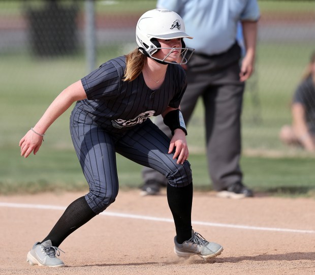 Kaneland's Isabelle Stombres (14) takes her lead off of first after being hit by a pitch in the fourth inning during a Class 2A Kaneland Regional semifinal game against Crystal Lake Central on Tuesday, May 21, 2024 in Maple Park. Stombres is battling diabetes, Kaneland advanced with the 3-0 win. Kaneland advanced with the 3-0 win.H. Rick Bamman / For the Beacon-News