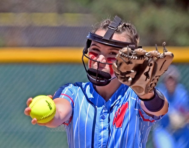 West Aurora's Katelyn Serafin concentrates on her pitch. West Aurora lost to Wheaton North 11-1, in a Class 4A Metea Valley Regional softball final, Saturday, May 25, 2024, in Aurora, Illinois. (Jon Langham/for the Beacon-News)