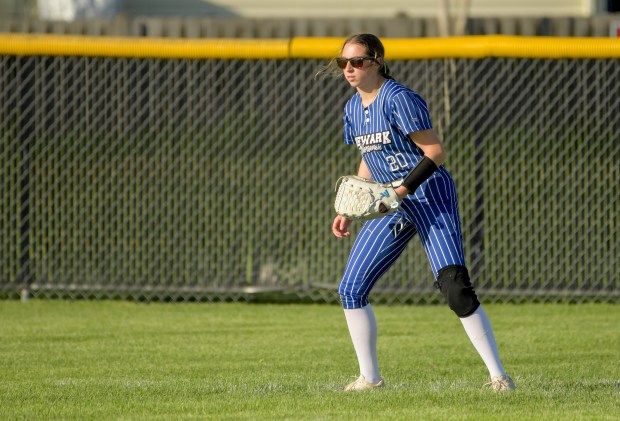 Newark's Kodi Rizzo (20) takes up her position in center field against Plano on Friday, May 3, 2024. (Mark Black / for the Beacon-News)