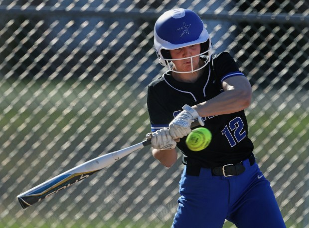 St. Charles North's Haley Nelson (12) takes a swing at a pitch against West Aurora during a non-conference game on Monday, April, 8, 2024. St. Charles North won, 13-0.H. Rick Bamman / For the Beacon News