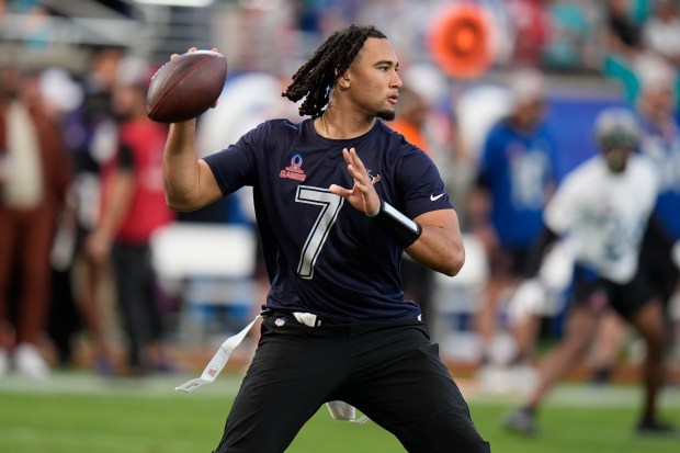 AFC quarterback C.J. Stroud, of the Houston Texans, throws against the NFC during the flag football event at the NFL Pro Bowl football game, Sunday, Feb. 4, 2024, in Orlando. (AP Photo/Chris O'Meara)