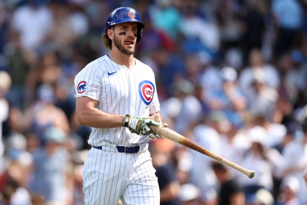 Chicago Cubs first baseman Patrick Wisdom (16) walks to the dugout after striking out to end the 8th inning of a game against the Pittsburgh Pirates at Wrigley Field in Chicago on May 18, 2024.  (Chris Sweda/Chicago Tribune)