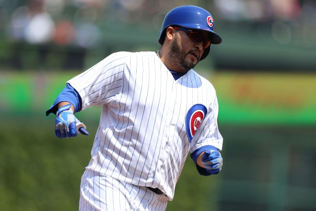 Dioner Navarro rounds third base after his solo home run in the second inning against the White Sox at Wrigley Field on May 29, 2013 (Phil Velasquez/Chicago Tribune)