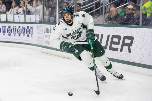 Michigan State's Artyom Levshunov skates with the puck against Minnesota on Jan. 26, 2024, at Munn Ice Arena in East Lansing, Mich. (Michael Miller/ISI Photos/Getty)