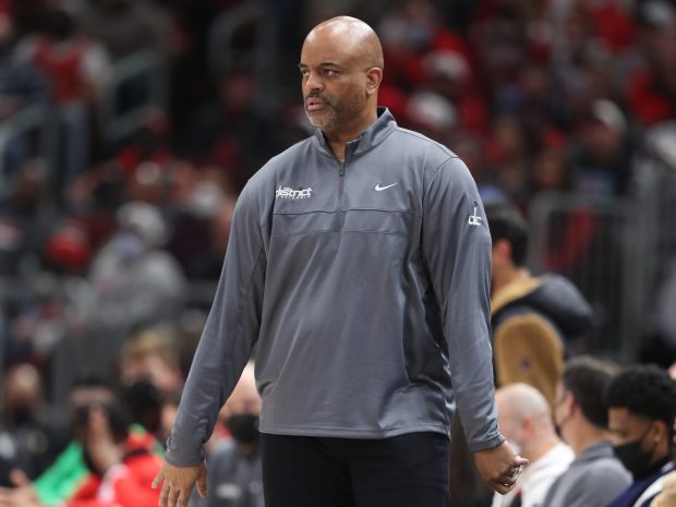 Wizards coach Wes Unseld Jr. walks the sideline in the first quarter against the Bulls on Jan. 7, 2022, at the United Center. (John J. Kim/Chicago Tribune)