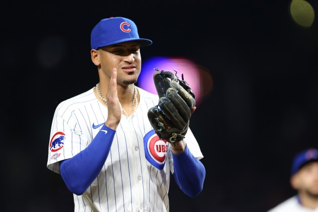 Cubs infielder Luis Vazquez applauds while heading to the dugout in the ninth inning against the Braves on Wednesday, May 22, 2024, at Wrigley Field. (John J. Kim/Chicago Tribune)