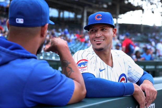 Cubs infielder Luis Vazquez relaxes in the dugout before a game against the Braves on Tuesday, May 21, 2024, at Wrigley Field. (Chris Sweda/Chicago Tribune)