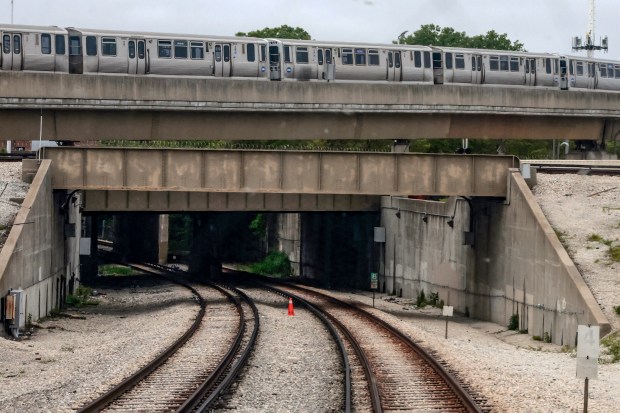 A CTA Purple Line train crosses May 15, 2024 over the area where a Yellow Line train crashed in Nov. near the Howard station in Chicago. (Antonio Perez/Chicago Tribune)