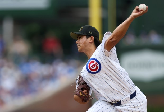 Chicago Cubs starting pitcher Shota Imanaga (18) delivers to the Pittsburgh Pirates in the third inning of a game at Wrigley Field in Chicago on May 18, 2024. (Chris Sweda/Chicago Tribune)